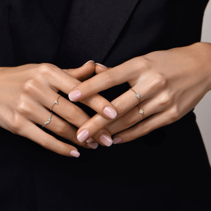 Bague Magic Touch chaîne croix